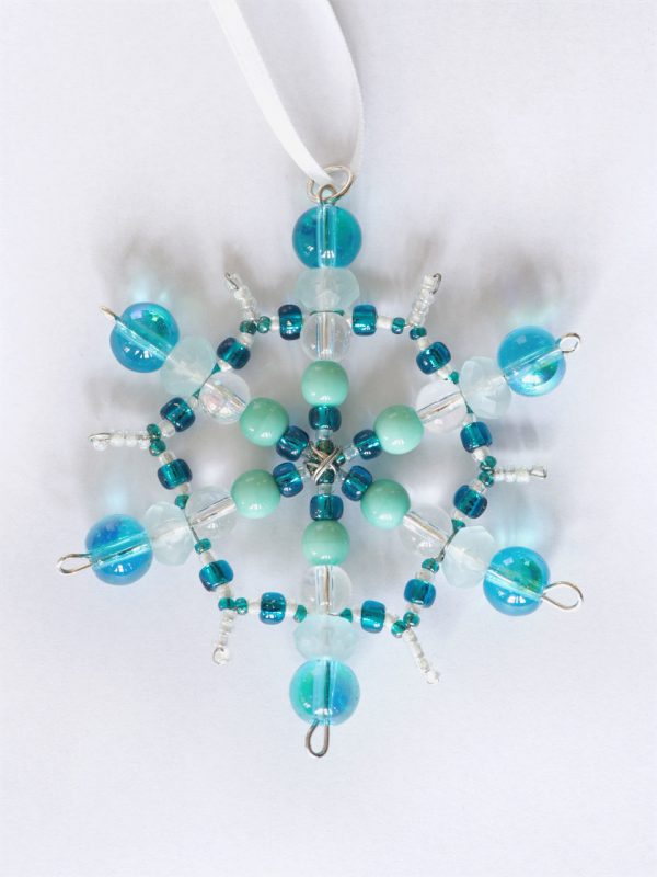 Blue and white beaded snowflake pendant